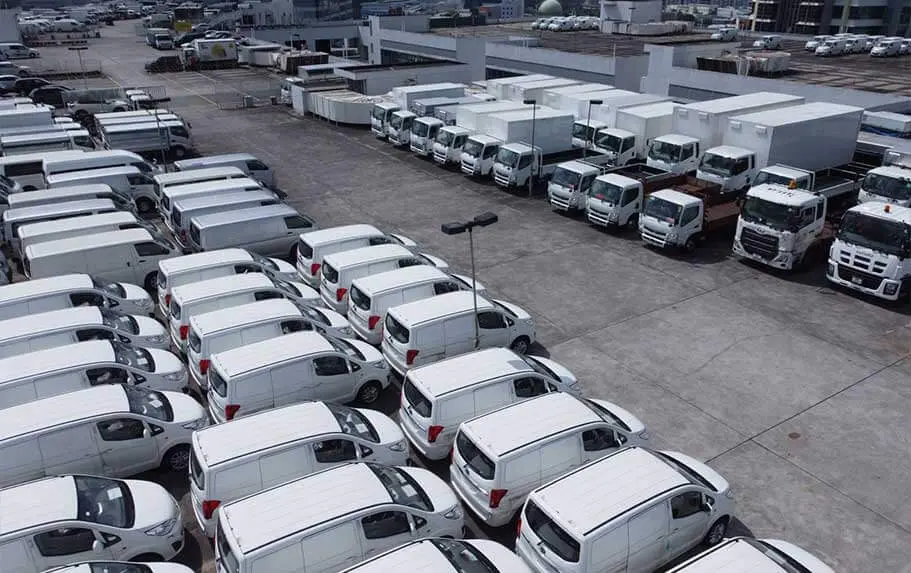 second hand commercial vehicles in a parking lot.